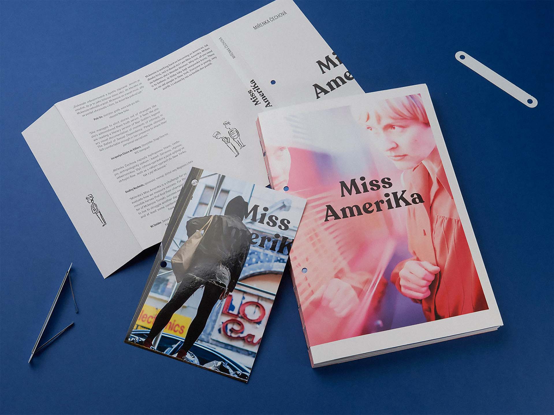 Miss AmeriKa book complete cover taken apart on blue background